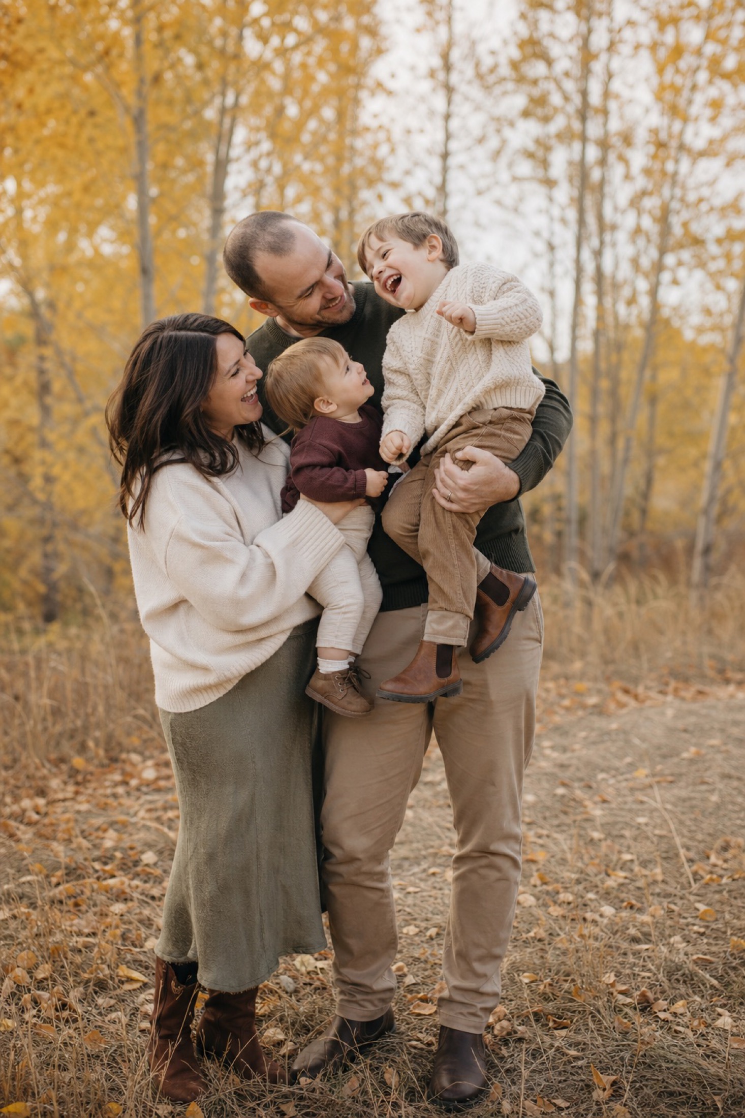 Relaxed family in neutral and earthy autumn clothing