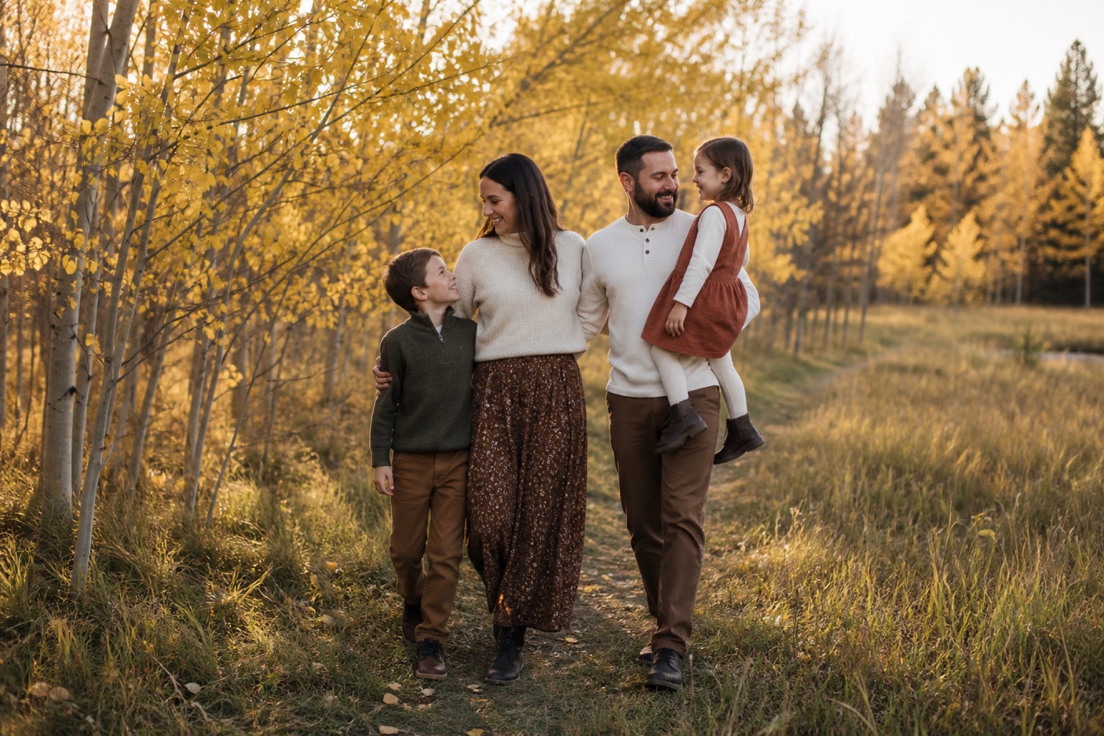 Family wearing coordinated autumn clothing in Calgary